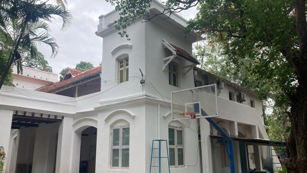Institutional building exterior with a clean white finish